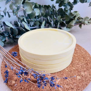Set of four jesmonite coasters in lemon yellow - Refill Mill