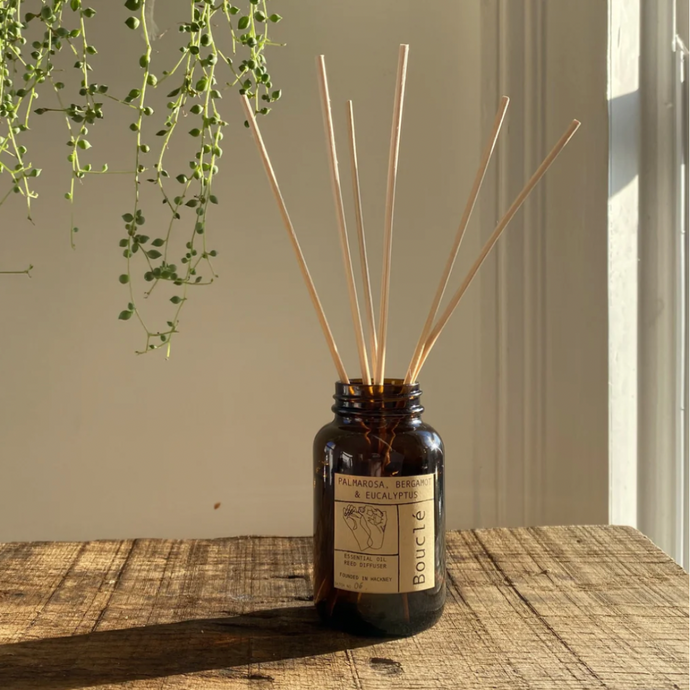 Aromatherapy essential oil scent blend rattan reed diffuser home fragrance - palmarosa, bergamot and eucalyptus.