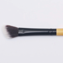 Load image into Gallery viewer, Close up on an Bamboo Vegan Angled Blending Makeup Brush
