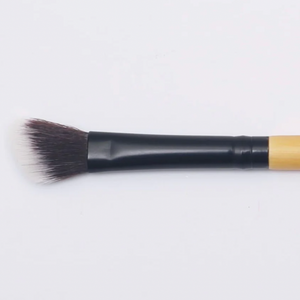 Close up on an Bamboo Vegan Angled Blending Makeup Brush