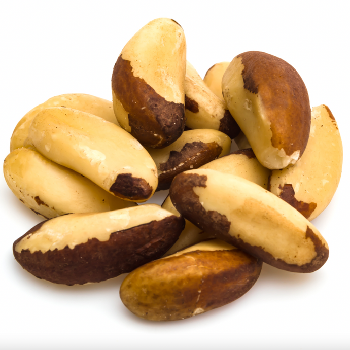 Organic brazil nuts on white background - Refill Mill