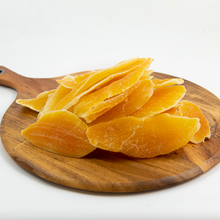 Load image into Gallery viewer, Organic dried mango on wooden board - Refill Mill
