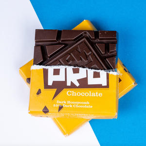 Temprd Chocolate Bar Small - Dark Honeycomb Chocolate with wrapper peeled back to reveal chunky chocolate.