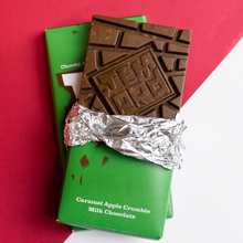 Load image into Gallery viewer, Temprd Chocolate Bar Large - Caramel Apple Crumble Milk Chocolate with wrapper peeled back to reveal chunky chocolate.
