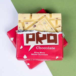 Temprd Chocolate Bar Small - Eton Mess White Chocolate with wrapper peeled back to reveal chunky chocolate.